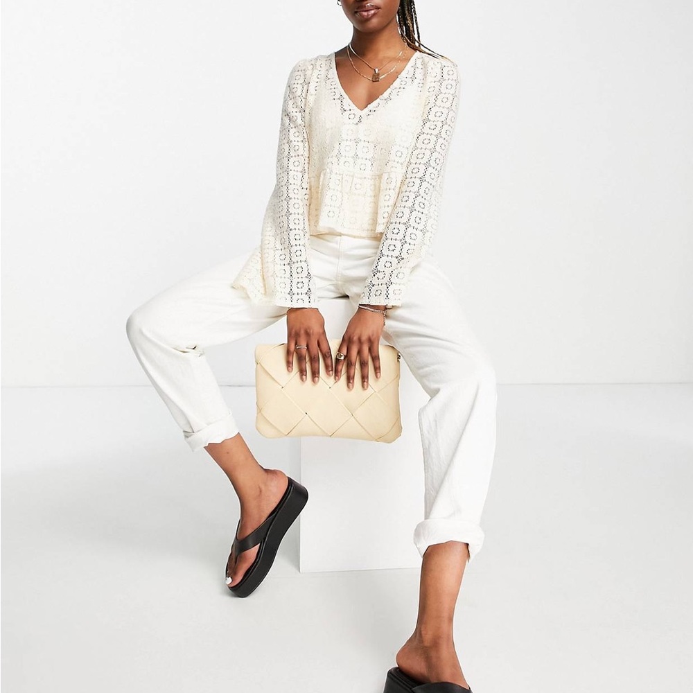 ASOS design cropped long sleeve crochet top with peplum hem in cream